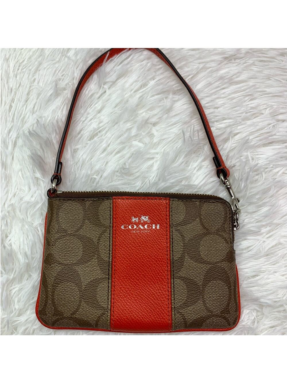 COACH Brown and Orange Coated Canvas Wristlet